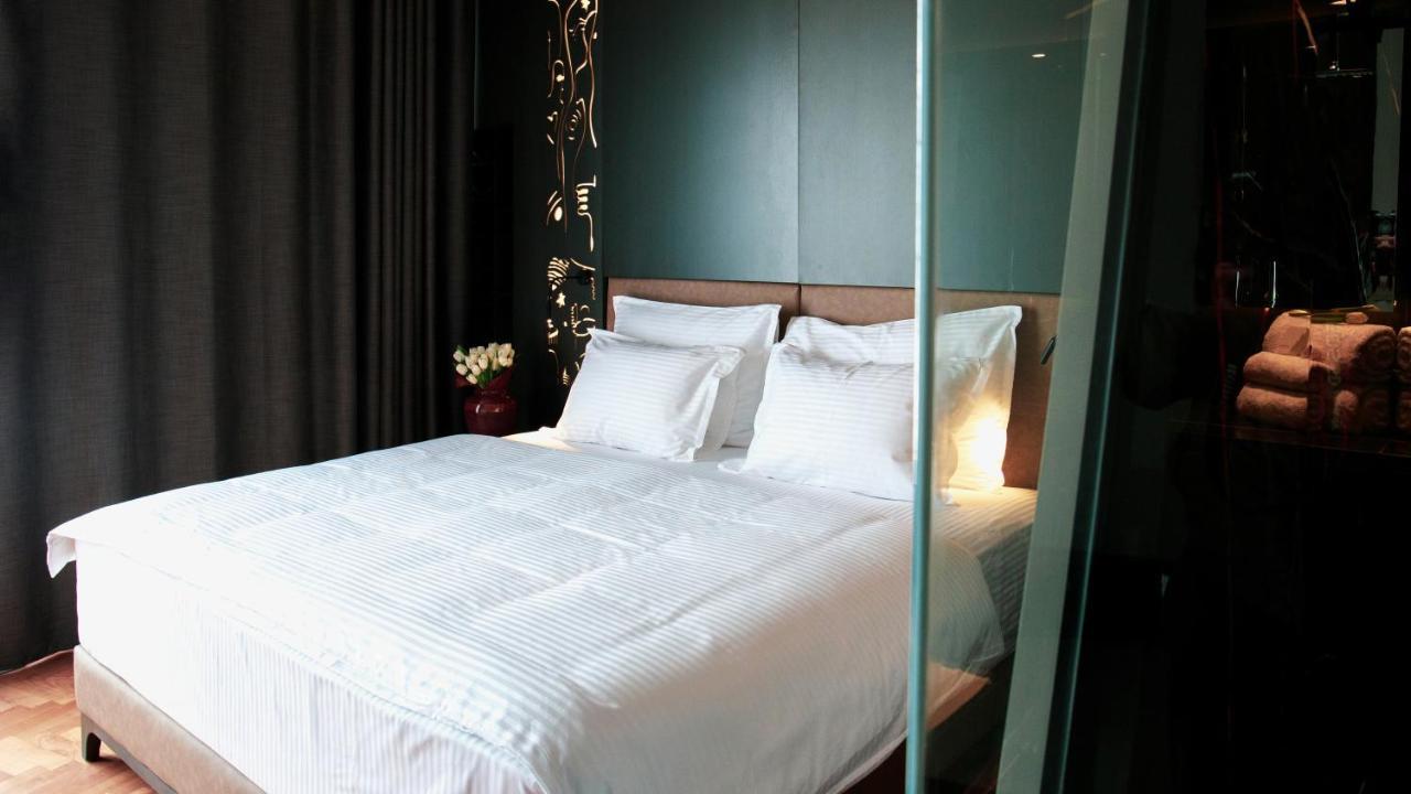 Arka Art Hotel Kashari Εξωτερικό φωτογραφία A bed with white sheets
